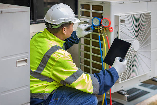 Professional Hvac technician working in Huntersville, NC